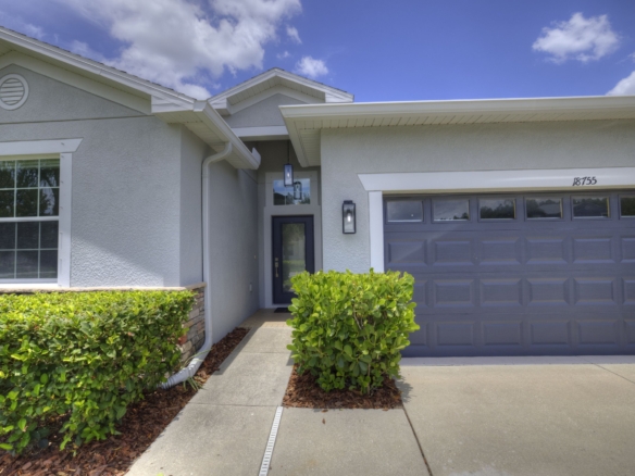 Front exterior of 18755 Burndall Court, Land O Lakes FL — sold single-family home