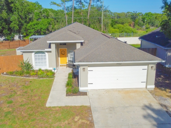 Front exterior of 1932 Kettler Drive, Lutz FL — sold single-family home with house number 1932 visible